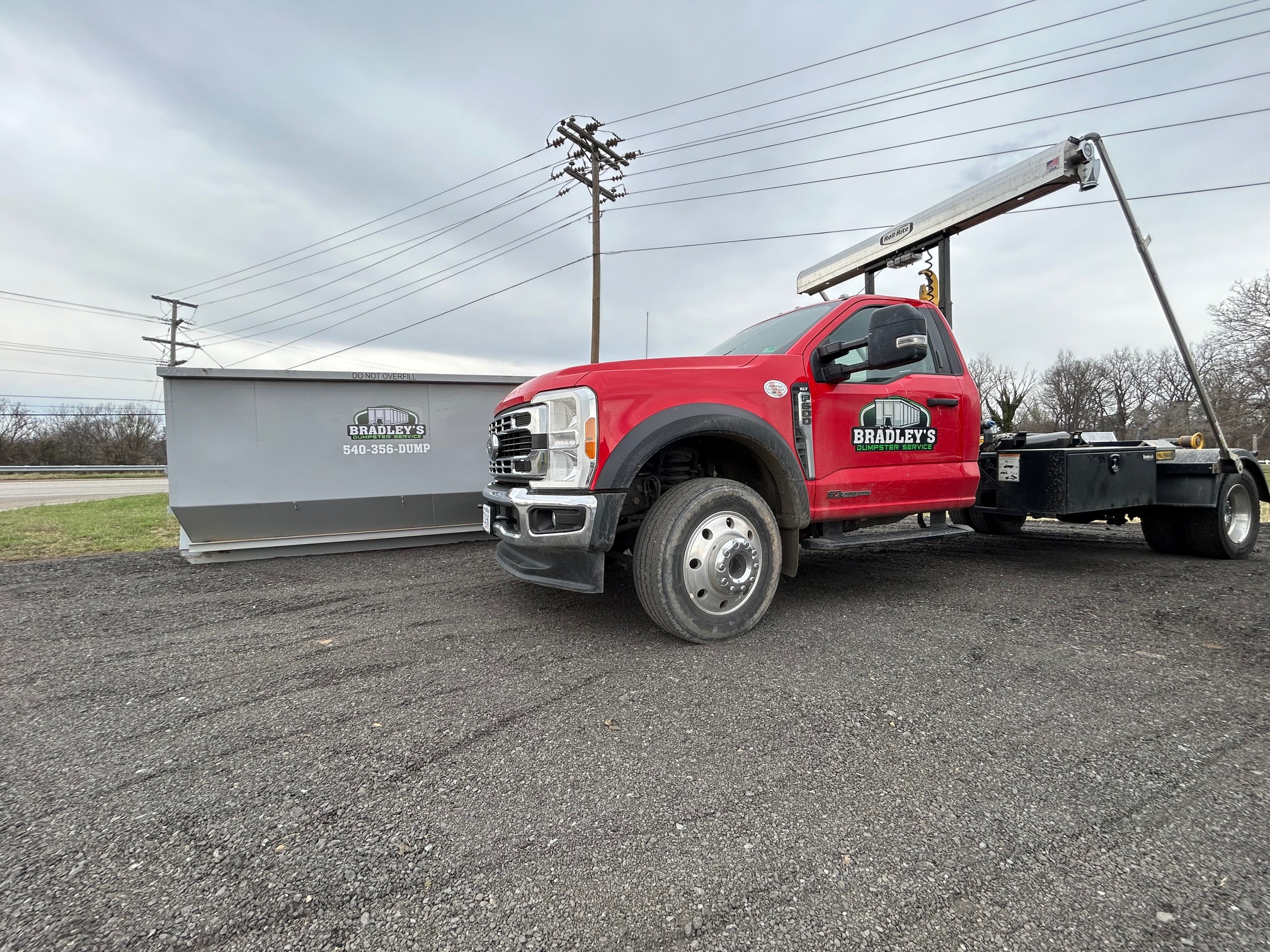 Bradley's Dumpster Service truck delivering in Bridgewater VA